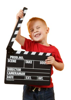 Dziecko z klapsem filmowym - zdjęcie ozdobne